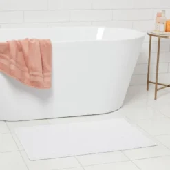 20"x32" Snow Leopard Bath Mat White - Thresholdâ˘